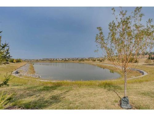 404-260 Rowley Way Nw, Calgary, AB - Outdoor With Body Of Water With View