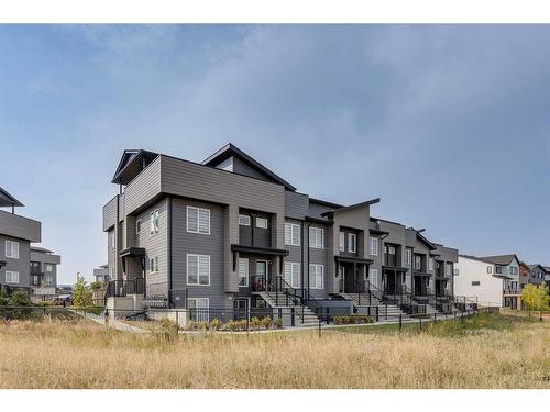 404-260 Rowley Way Nw, Calgary, AB - Outdoor With Facade