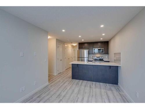 404-260 Rowley Way Nw, Calgary, AB - Indoor Photo Showing Kitchen