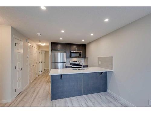 404-260 Rowley Way Nw, Calgary, AB - Indoor Photo Showing Kitchen