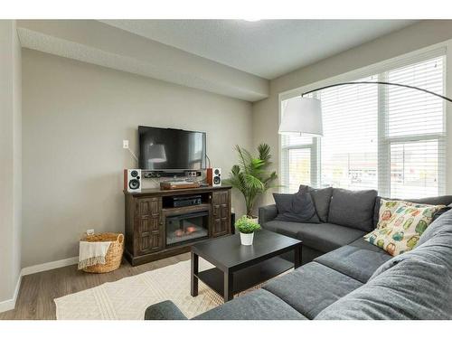 111 New Brighton Walk Se, Calgary, AB - Indoor Photo Showing Living Room