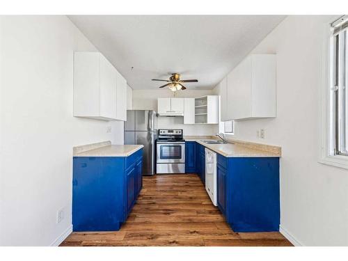 9 Marwood Circle Ne, Calgary, AB - Indoor Photo Showing Kitchen With Double Sink