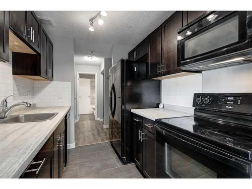 406-550 Westwood Drive Sw, Calgary, AB - Indoor Photo Showing Kitchen