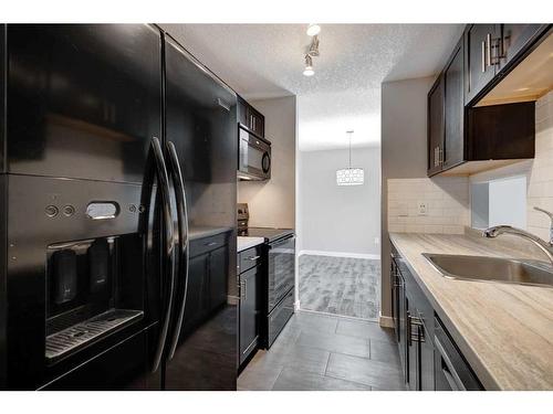 406-550 Westwood Drive Sw, Calgary, AB - Indoor Photo Showing Kitchen