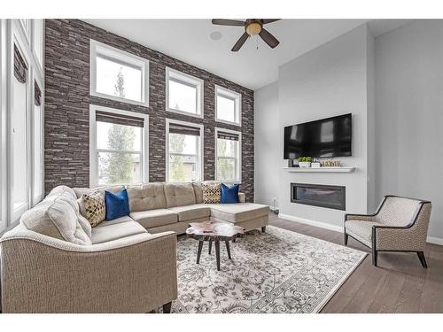 40 Evansfield Place Nw, Calgary, AB - Indoor Photo Showing Living Room With Fireplace