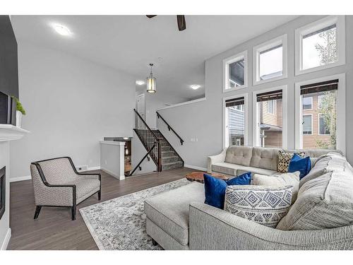 40 Evansfield Place Nw, Calgary, AB - Indoor Photo Showing Living Room With Fireplace