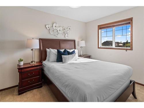 228 Sagewood Landing Sw, Airdrie, AB - Indoor Photo Showing Bedroom