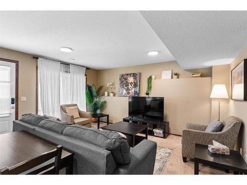 228 Sagewood Landing Sw, Airdrie, AB - Indoor Photo Showing Living Room