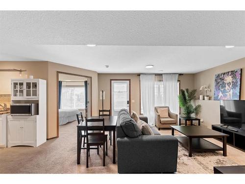 228 Sagewood Landing Sw, Airdrie, AB - Indoor Photo Showing Living Room