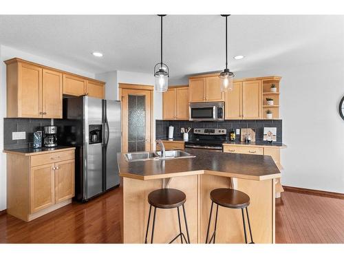 228 Sagewood Landing Sw, Airdrie, AB - Indoor Photo Showing Kitchen With Double Sink