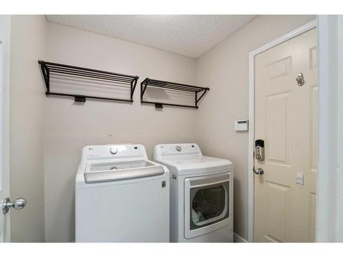 276 Cove Dr, Chestermere, AB - Indoor Photo Showing Laundry Room