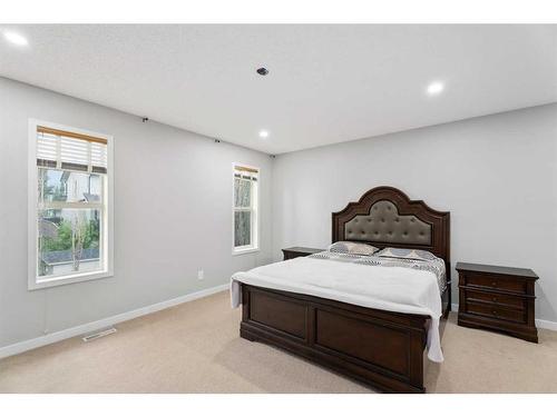 276 Cove Dr, Chestermere, AB - Indoor Photo Showing Bedroom