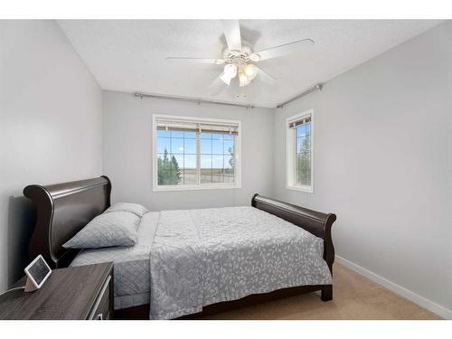 276 Cove Dr, Chestermere, AB - Indoor Photo Showing Bedroom