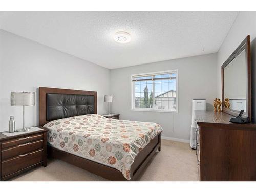 276 Cove Dr, Chestermere, AB - Indoor Photo Showing Bedroom