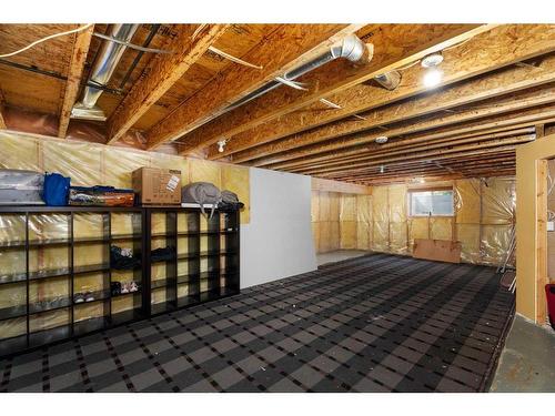 276 Cove Dr, Chestermere, AB - Indoor Photo Showing Basement