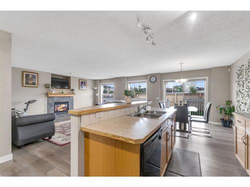 250 Saddlecrest Close Ne, Calgary, AB - Indoor With Fireplace