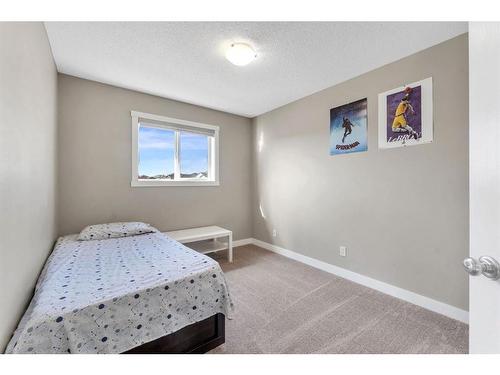 250 Saddlecrest Close Ne, Calgary, AB - Indoor Photo Showing Bedroom