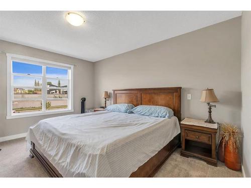 250 Saddlecrest Close Ne, Calgary, AB - Indoor Photo Showing Bedroom