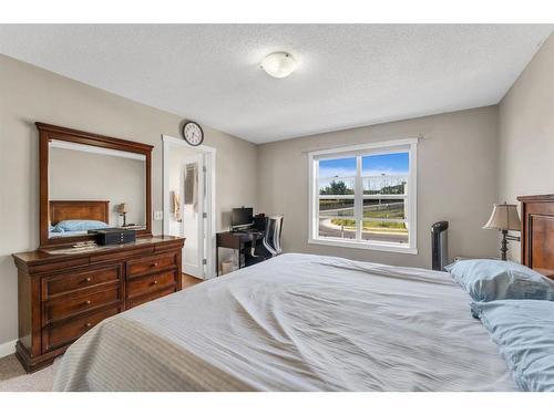 250 Saddlecrest Close Ne, Calgary, AB - Indoor Photo Showing Bedroom