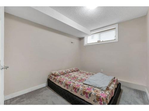 250 Saddlecrest Close Ne, Calgary, AB - Indoor Photo Showing Bedroom