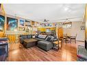 52 Hawkcliff Way Nw, Calgary, AB  - Indoor Photo Showing Living Room 