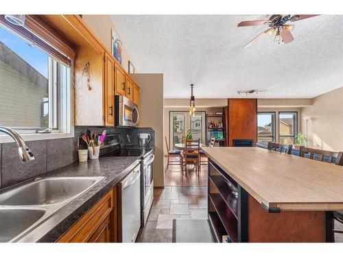 52 Hawkcliff Way Nw, Calgary, AB - Indoor Photo Showing Kitchen With Double Sink