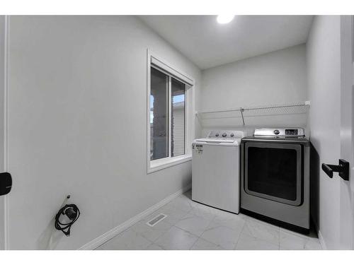 25 Corner Meadows Gardens Ne, Calgary, AB - Indoor Photo Showing Laundry Room