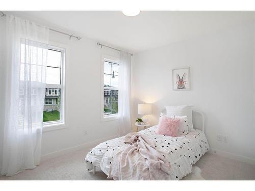 38 Dawson Drive, Chestermere, AB - Indoor Photo Showing Bedroom