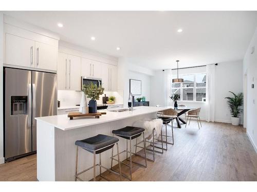 38 Dawson Drive, Chestermere, AB - Indoor Photo Showing Kitchen With Stainless Steel Kitchen With Upgraded Kitchen