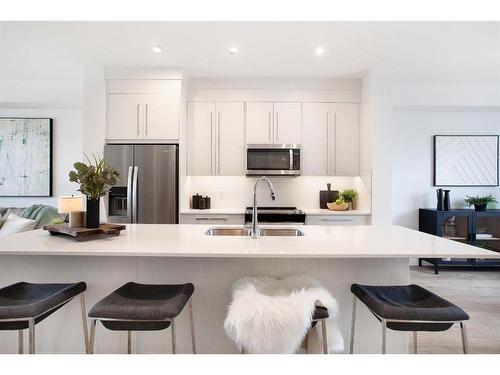 38 Dawson Drive, Chestermere, AB - Indoor Photo Showing Kitchen With Stainless Steel Kitchen With Double Sink With Upgraded Kitchen