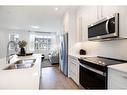 38 Dawson Drive, Chestermere, AB  - Indoor Photo Showing Kitchen With Stainless Steel Kitchen With Double Sink With Upgraded Kitchen 