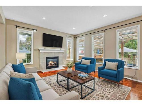 461 Cranford Drive Se, Calgary, AB - Indoor Photo Showing Living Room With Fireplace