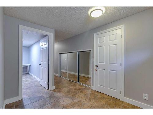 83 Lake Sylvan Close Se, Calgary, AB - Indoor Photo Showing Other Room