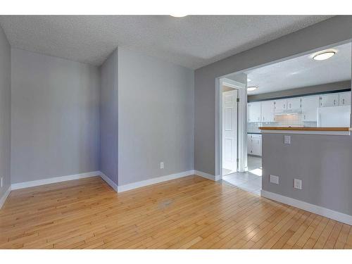 83 Lake Sylvan Close Se, Calgary, AB - Indoor With Fireplace