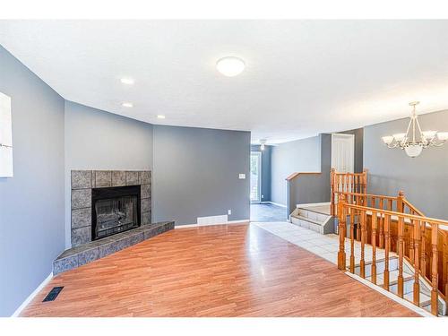 4152 Doverbrook Road Se, Calgary, AB - Indoor With Fireplace