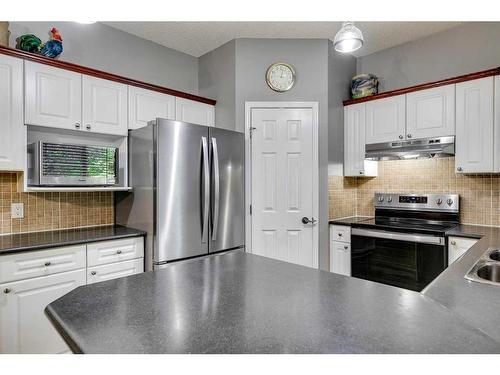 112 Inverness Drive Se, Calgary, AB - Indoor Photo Showing Kitchen With Stainless Steel Kitchen