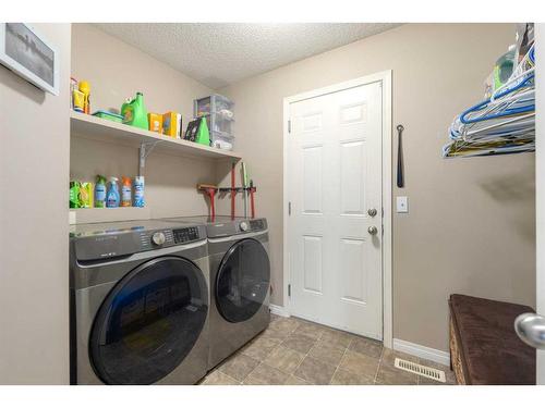 19 Copperfield Common Se, Calgary, AB - Indoor Photo Showing Laundry Room