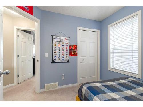 19 Copperfield Common Se, Calgary, AB - Indoor Photo Showing Bedroom