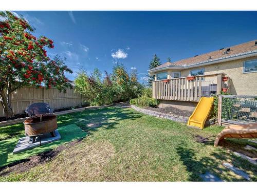 25 West Gissing Road, Cochrane, AB - Outdoor With Deck Patio Veranda With Backyard