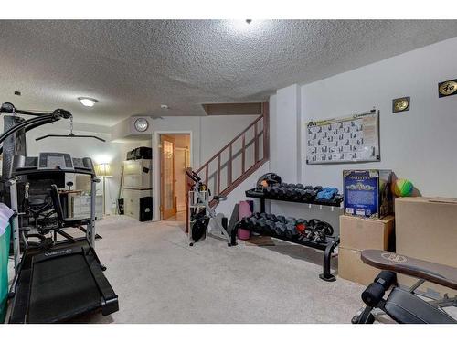 95 Applestone Park Se, Calgary, AB - Indoor Photo Showing Gym Room