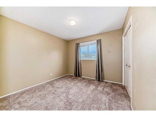 9 Spring Crescent Sw, Calgary, AB - Indoor Photo Showing Other Room