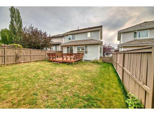 9 Spring Crescent Sw, Calgary, AB - Outdoor With Deck Patio Veranda