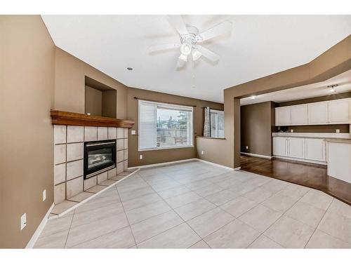 9 Spring Crescent Sw, Calgary, AB - Indoor With Fireplace