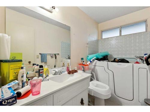 8 Dalzell Place Nw, Calgary, AB - Indoor Photo Showing Laundry Room