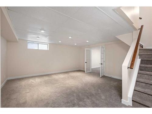 135 Mt Apex Crescent Se, Calgary, AB - Indoor Photo Showing Basement