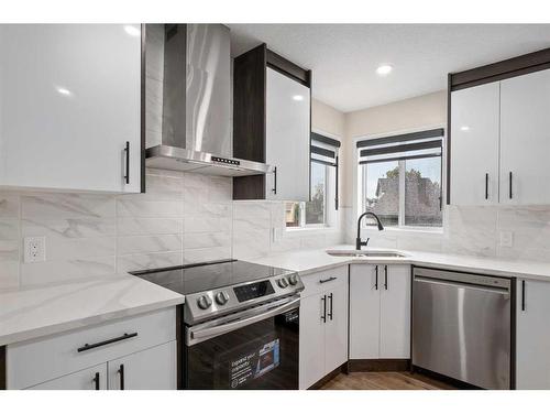 135 Mt Apex Crescent Se, Calgary, AB - Indoor Photo Showing Kitchen With Upgraded Kitchen