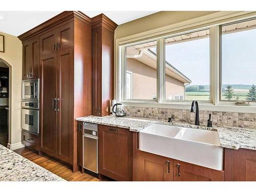 96035 408 Avenue West, Rural Foothills County, AB - Indoor Photo Showing Kitchen With Double Sink