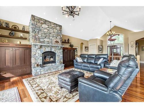 96035 408 Avenue West, Rural Foothills County, AB - Indoor Photo Showing Living Room With Fireplace