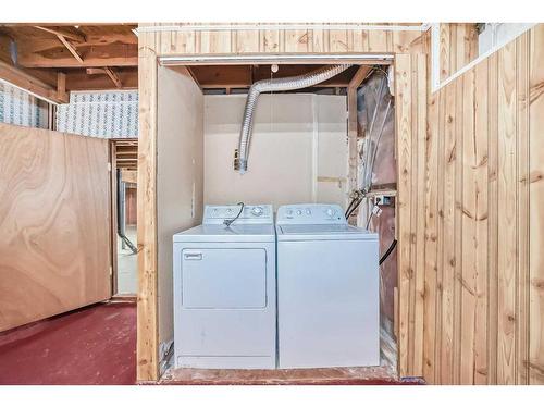 68 Millbank Crescent Sw, Calgary, AB - Indoor Photo Showing Laundry Room