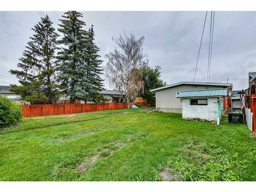 383 Acadia Drive Se, Calgary, AB - Outdoor With Backyard